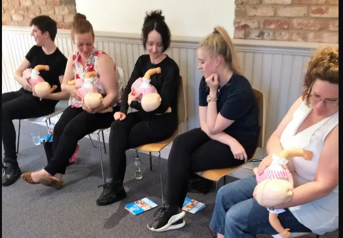 Baby First Aid Didsbury Parents on a Baby First Aid course In Didsbury